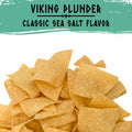 A pile of triangular beef tallow tortilla chips on a white background with a teal banner at the top reading 'VIKING PLUNDER' and 'CLASSIC SEA SALT FLAVOR'.