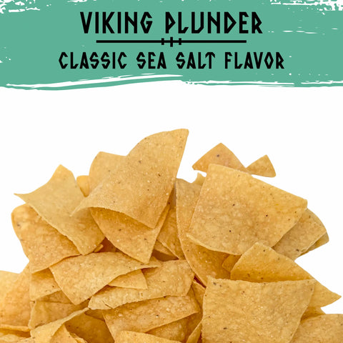 A pile of triangular beef tallow tortilla chips on a white background with a teal banner at the top reading 'VIKING PLUNDER' and 'CLASSIC SEA SALT FLAVOR'.
