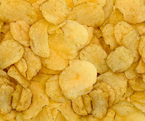 large pile of golden brown kettle cooked beef tallow potato chips from Norse Roots