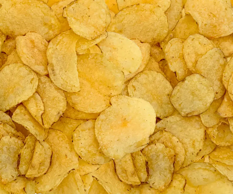 large pile of golden brown kettle cooked beef tallow potato chips from Norse Roots